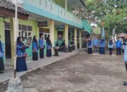 MI Al-Husna Kubang Gelar Upacara Peringatan Hari Pendidikan Nasional