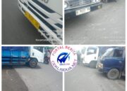 Dua Truk ELF Nopol L 8491 UL dan B 9237 DV Parkir Tidak Pada Tempatnya di Sebelah Pospol Tambaksari Kedung Cowek