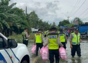 Melalui SPPG Polri, Polresta Pati Salurkan MBG untuk Warga Tondomulyo Terdampak Banjir
