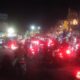 Ribuan Anggota PSHT Konvoi Keliling Surabaya, Kembang Api Menyala di Simpang Empat Kedung Cowek